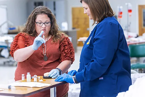 Adult education students in lab